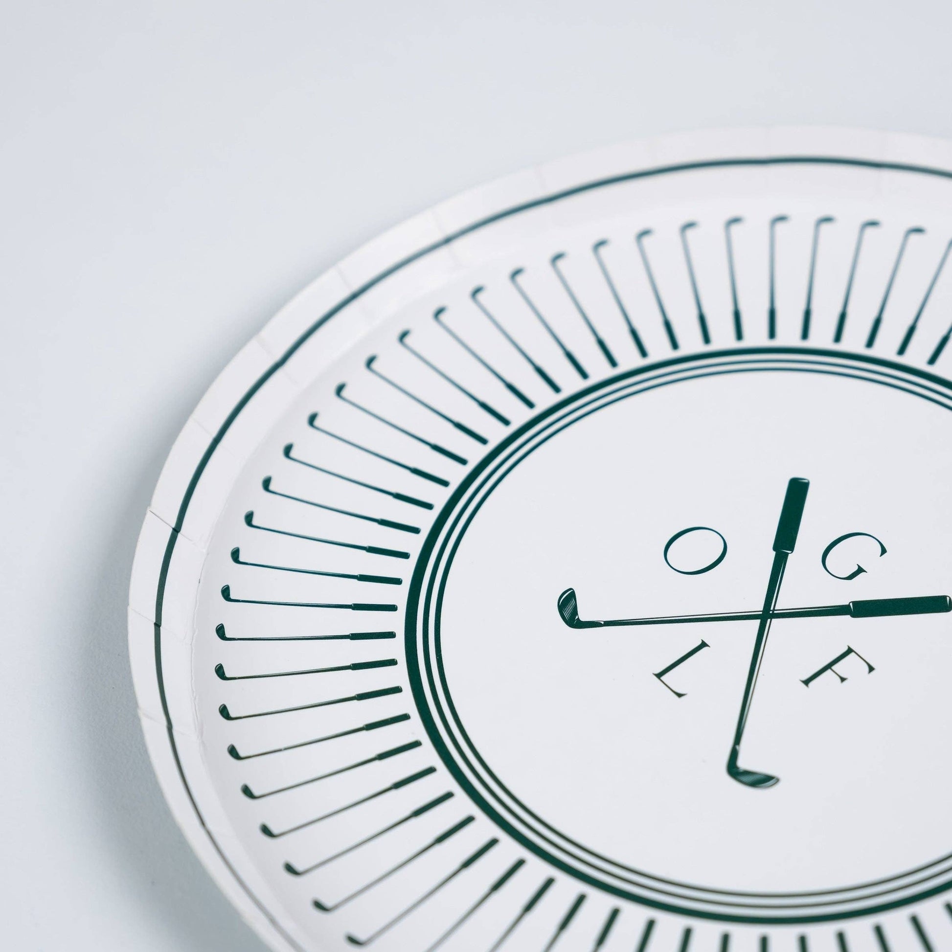 Set of 8 Gatherings by Curated Paperie 8.5-inch golf-themed dessert plates with vibrant golf ball and flag designs.
