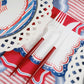 Patriotic 4th of July cocktail napkin with red, white, and blue stars and stripes by Gatherings by Curated Paperie