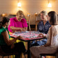 Pink Mahjong mat featuring a floral rose pattern, perfect for playing traditional Mahjong games at home.