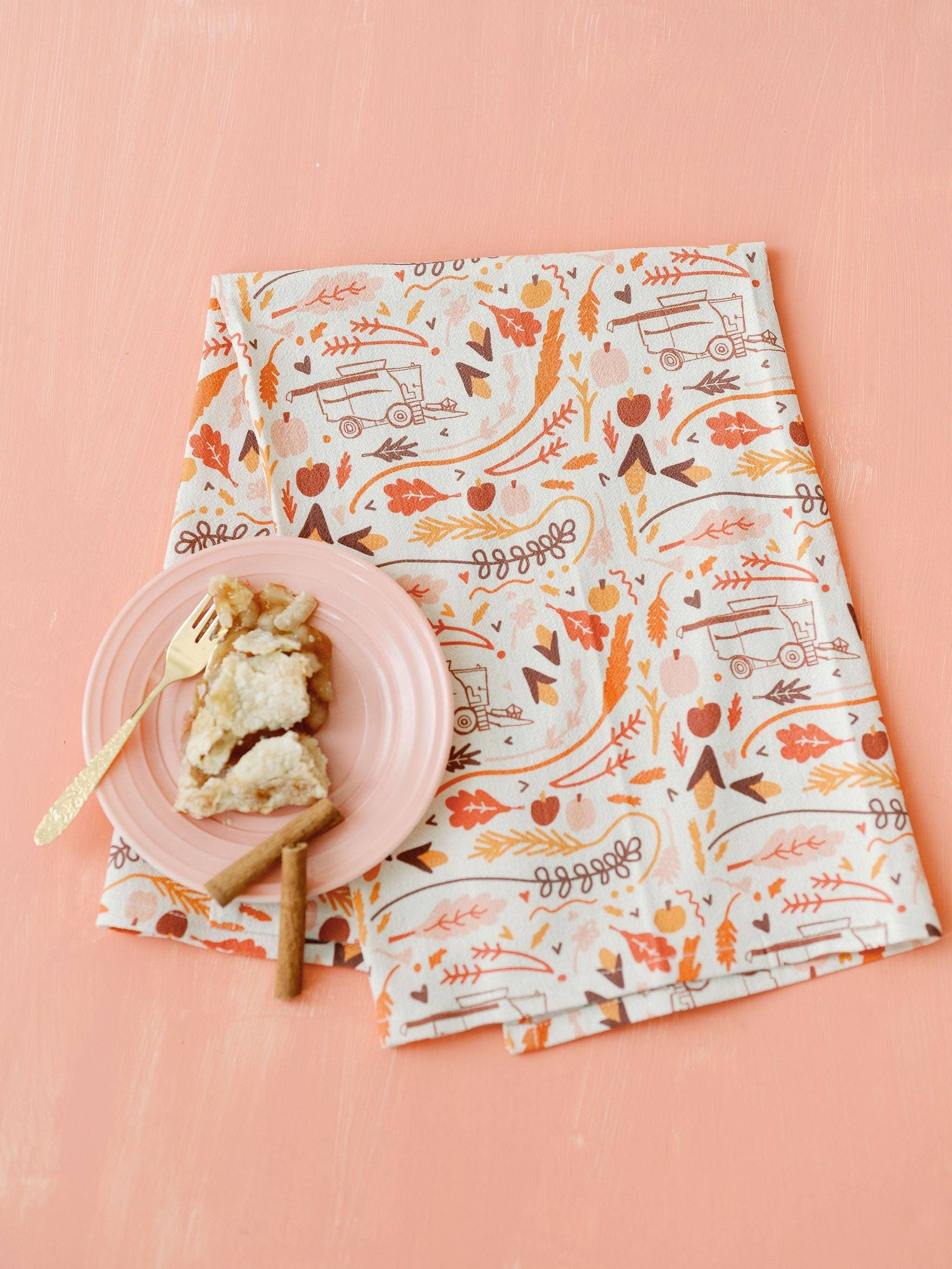 Fall-themed Flour Sack Towel with harvest and autumn full pattern from Doe A Deer, featuring vibrant fall leaf and pumpkin designs.