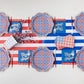 Red and blue gingham star dinner plates by Bonjour Fête, featuring a festive star pattern on classic gingham background.