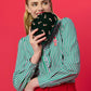Shiraleah Candy Cane Minaudière in forest green with white candy cane pattern, stylish small evening bag with gold clasp.