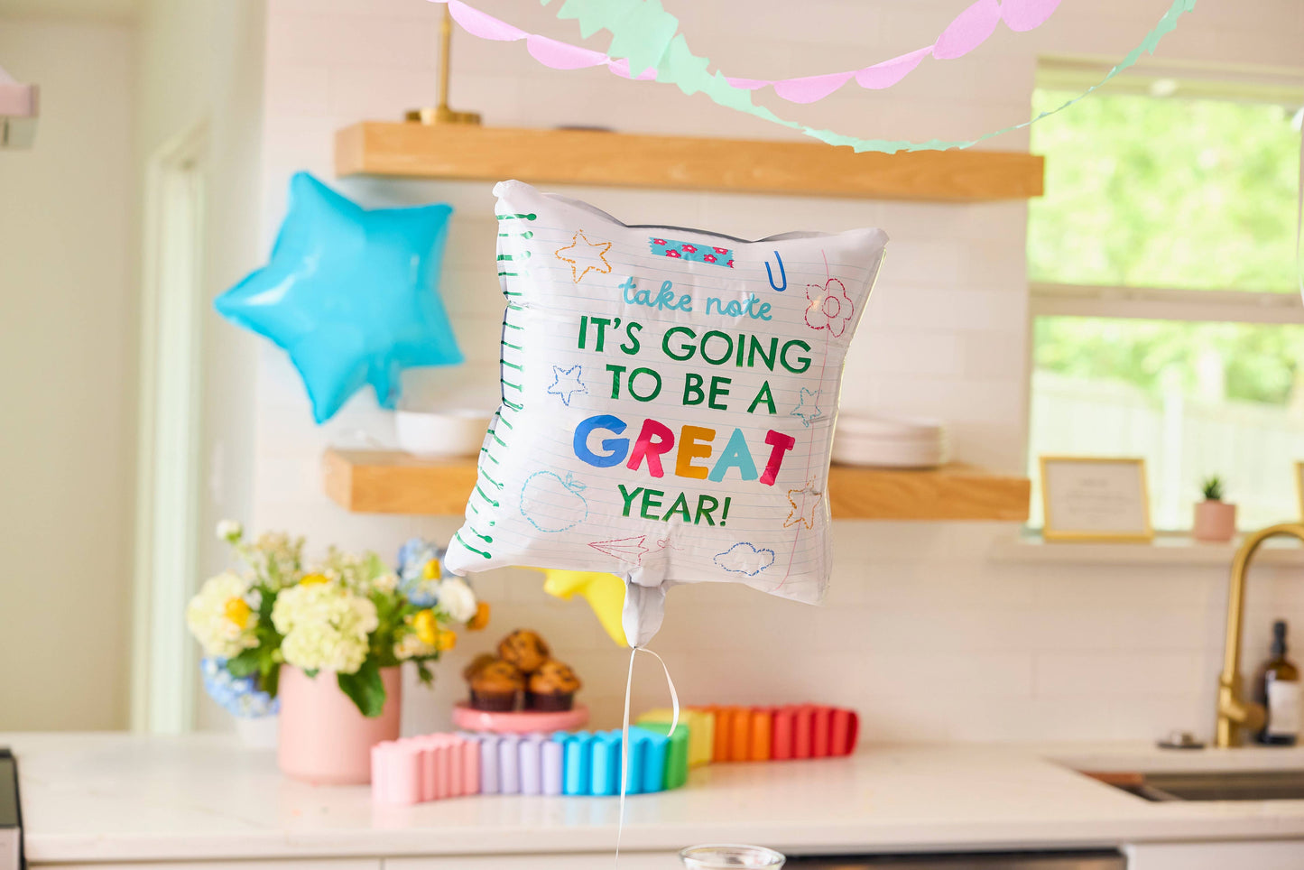 Packed Party Take Note Back to School Balloon Kit with colorful letter and number balloons for school celebration decorations.