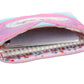 Taylor quilted hearts confetti pencil pouch by Packed Party with colorful heart patterns and a stylish quilted design.