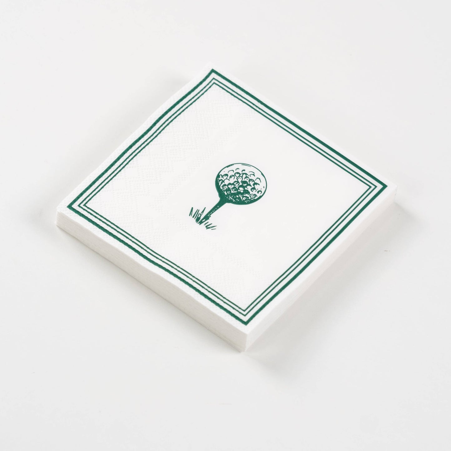Set of 16 golf-themed beverage napkins from Gatherings by Curated Paperie with golf ball and flag print.