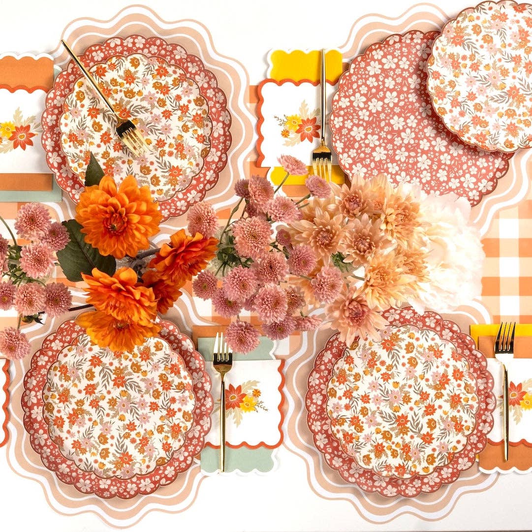 Autumn floral dinner plates with colorful fall leaf and flower patterns from Gatherings by Curated Paperie