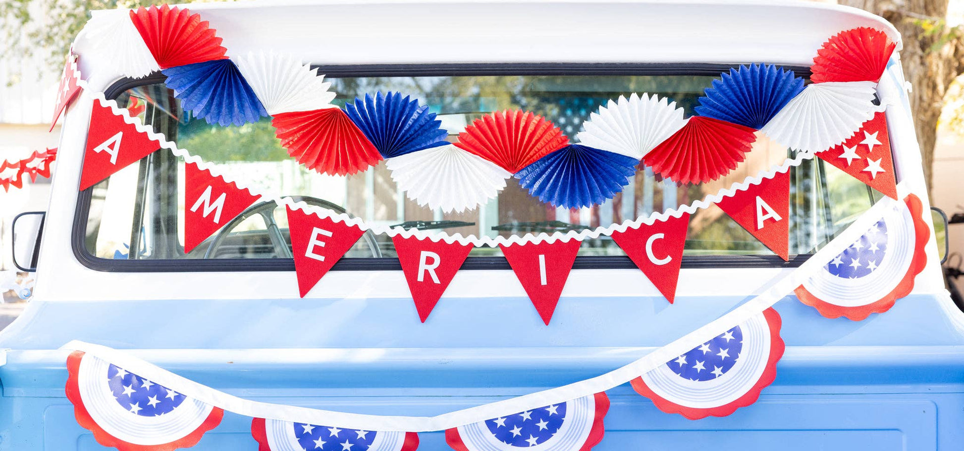 My Mind’s Eye America Felt Pennant Banner with red, white, and blue felt pennants for patriotic decoration and celebrations.