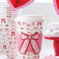 Set of 8 Bows To Go cups by My Mind’s Eye in colorful, decorative paper for gift wrapping or craft projects.