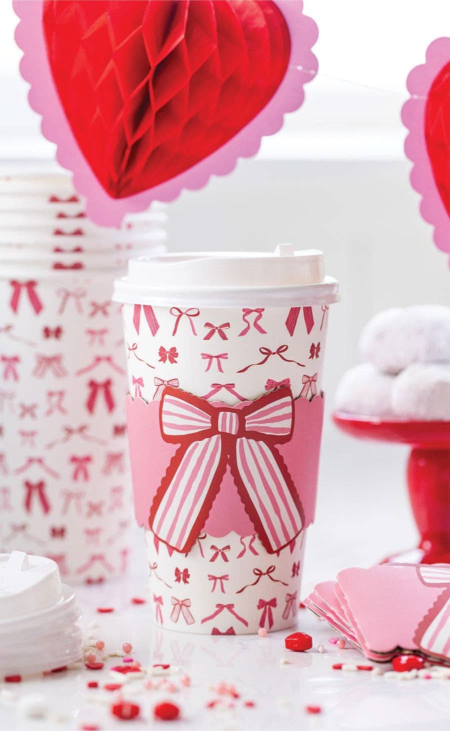 Set of 8 Bows To Go cups by My Mind’s Eye in colorful, decorative paper for gift wrapping or craft projects.