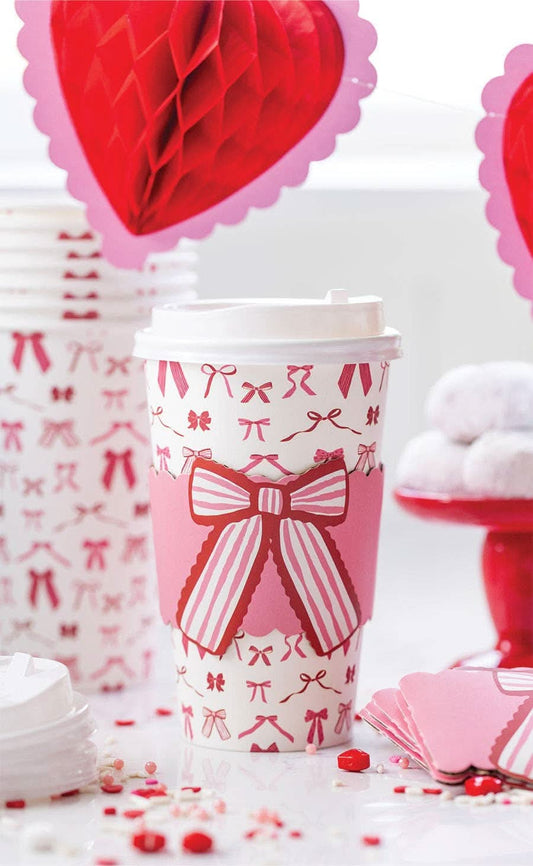 Set of 8 Bows To Go cups by My Mind’s Eye in colorful, decorative paper for gift wrapping or craft projects.