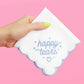 Handkerchief with embroidered "Happy Tears" design by xo, Fetti, featuring delicate stitching on soft fabric.