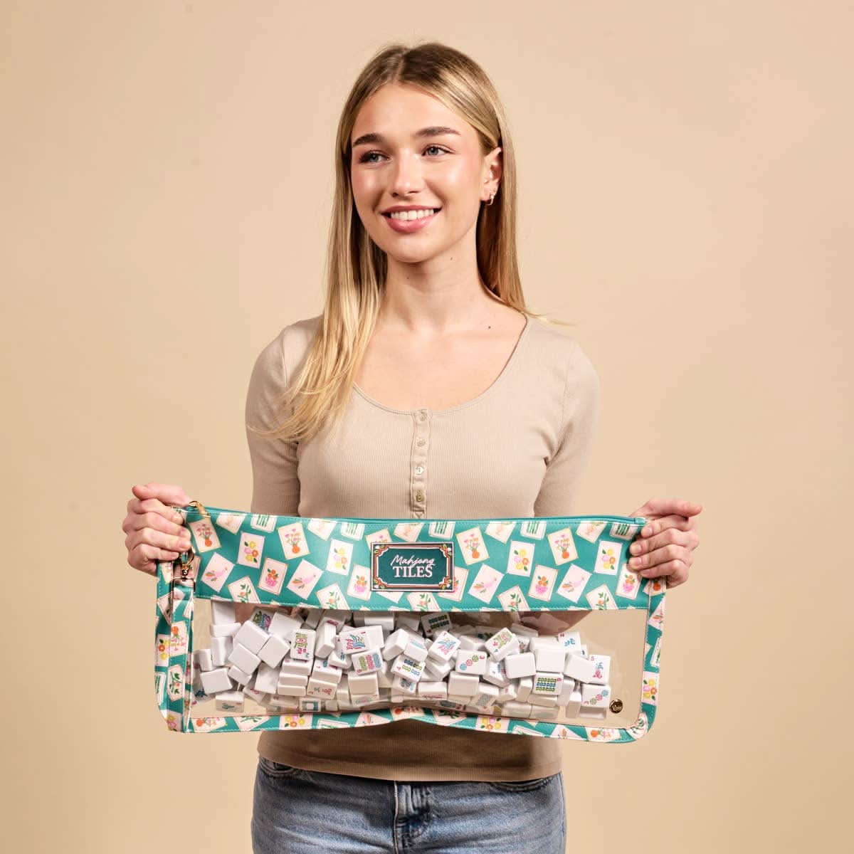 Mahjong tile keeper pouch in teal by The Darling Effect, featuring a compact design for storing and carrying Mahjong tiles.