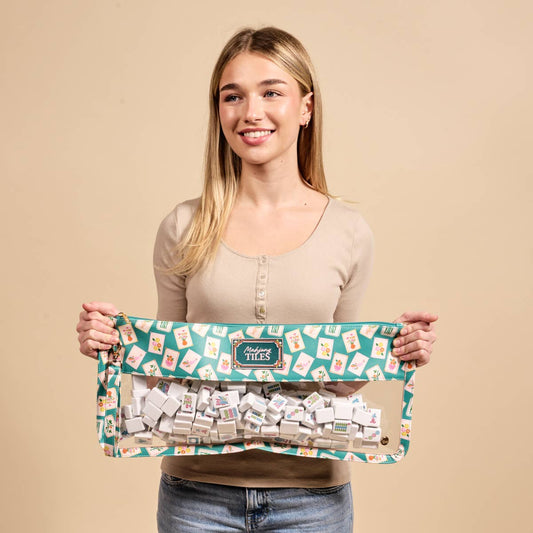Mahjong tile keeper pouch in teal by The Darling Effect, featuring a compact design for storing and carrying Mahjong tiles.