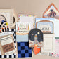 Graduation arch greeting card from Hats Off collection by Ginger P. Designs, featuring colorful celebratory artwork.