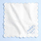 White embroidered handkerchief with "Happy Tears" design by xo, Fetti, featuring delicate embroidery and soft fabric.