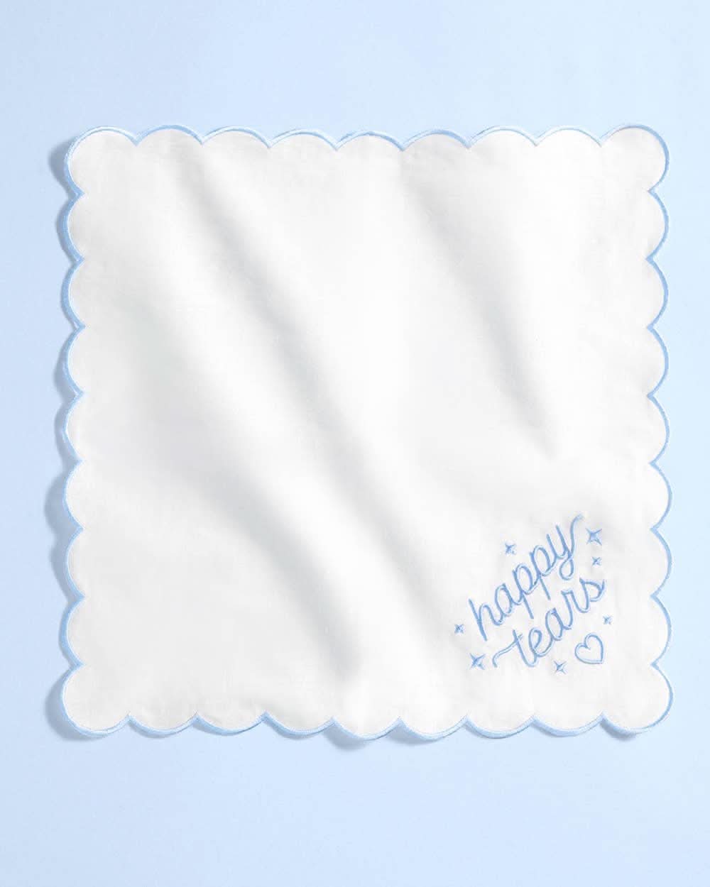White embroidered handkerchief with "Happy Tears" design by xo, Fetti, featuring delicate embroidery and soft fabric.