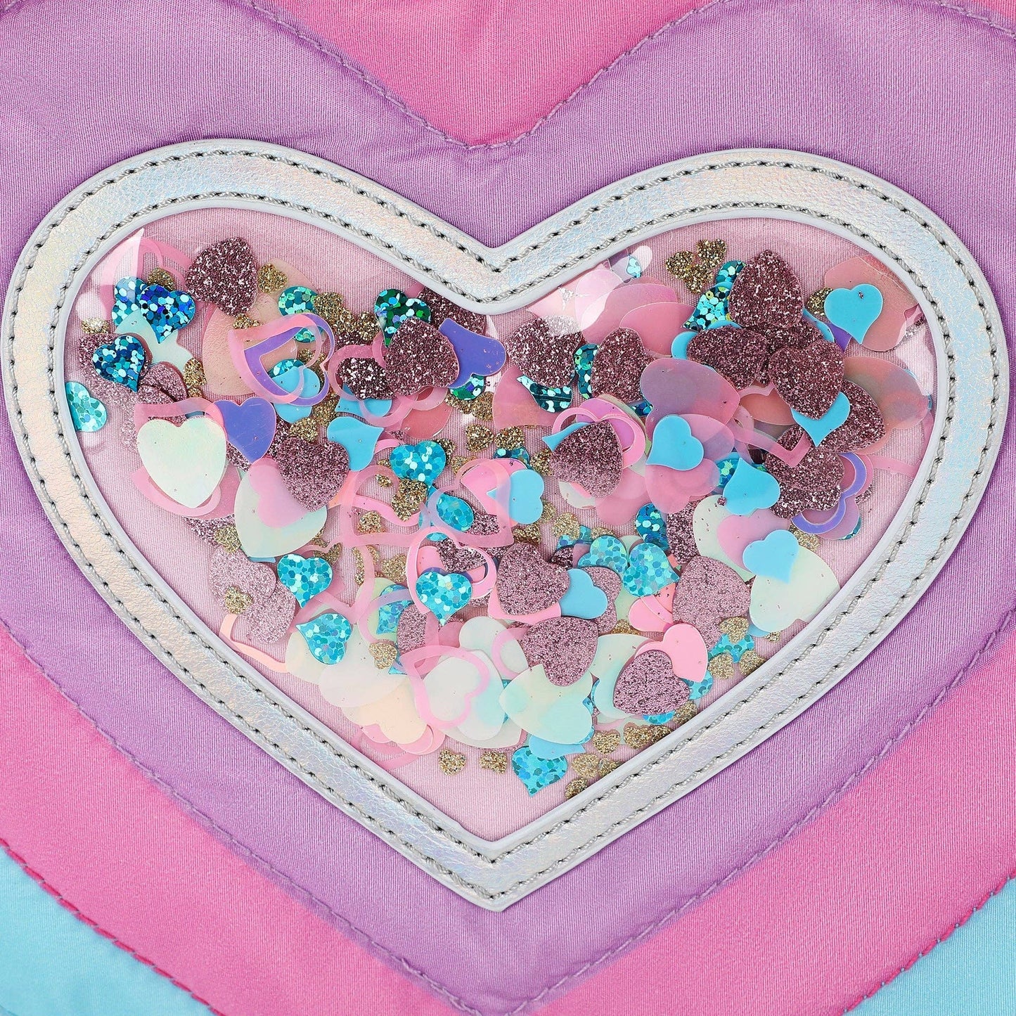 Packed Party Taylor Quilted Hearts Confetti Pencil Pouch with pink quilted fabric and colorful heart confetti design.