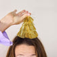 Set of four Golden Girl mini gold fringe party hats by Packed Party, featuring shiny gold fringe and festive design.