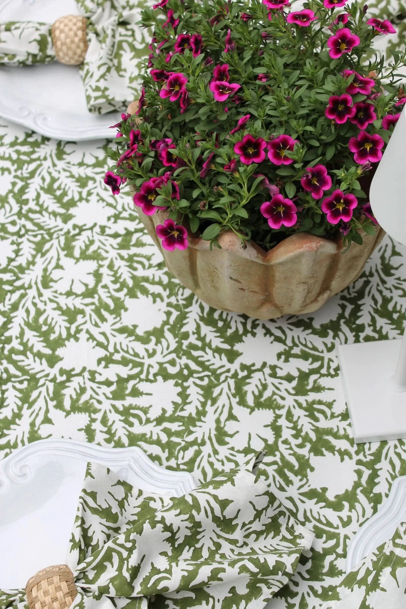 Set of four pressed floral napkins in olive green by Christina Dickson Home, featuring elegant botanical design.