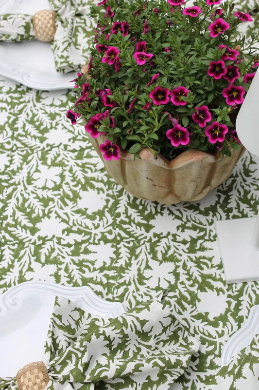 Set of four pressed floral napkins in olive green by Christina Dickson Home, featuring elegant botanical design.
