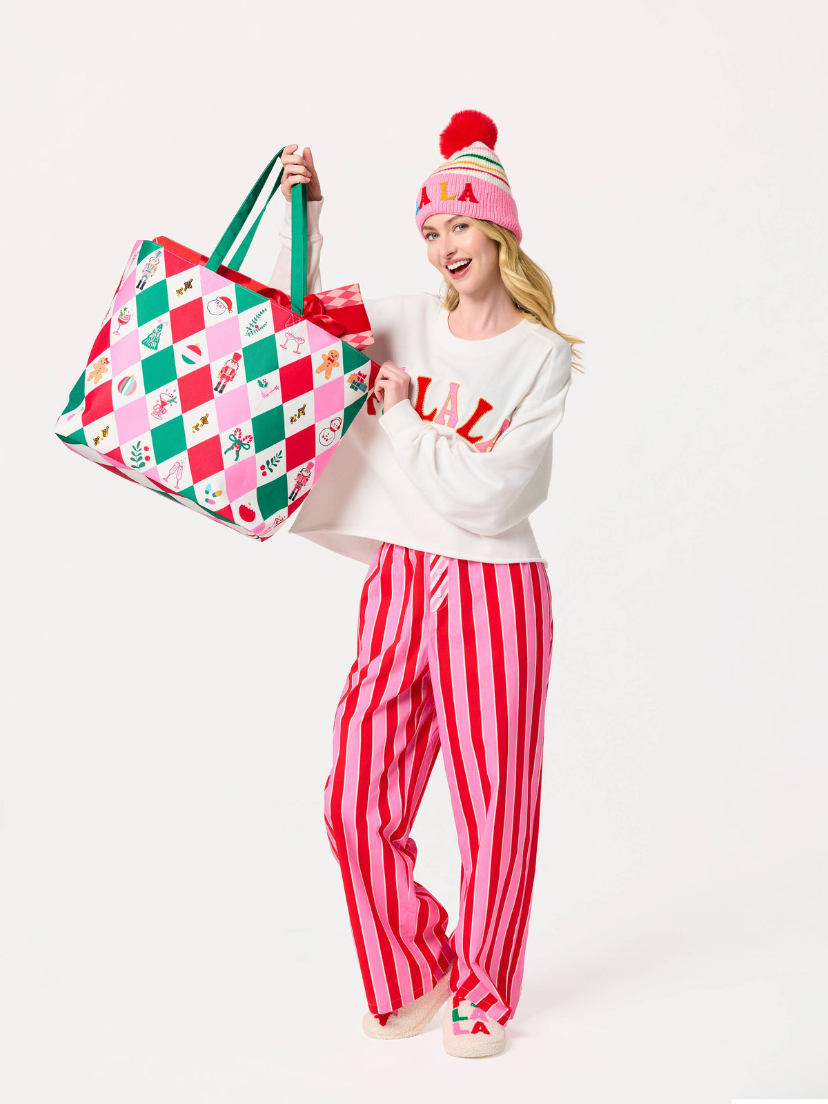 Shiraleah FA LA LA slippers in large/extra-large size with festive red and white pattern, cozy and comfortable for winter.